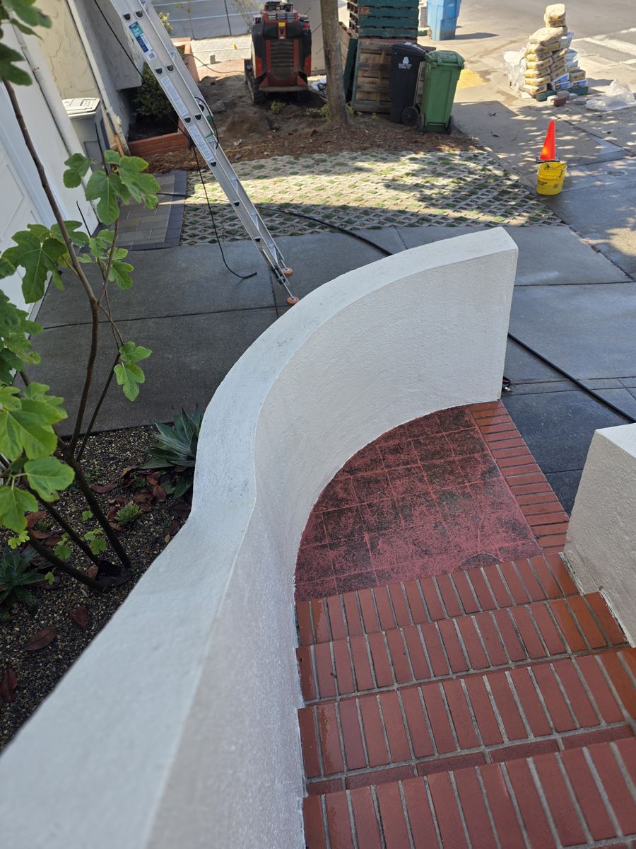 Stucco wall and steps after power washing